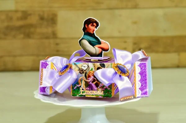 Arquivo de corte para caixa e decoração de festa aniversário Enrolados nos formatos Studio e PDF, ideal para lembrancinhas de princesas.