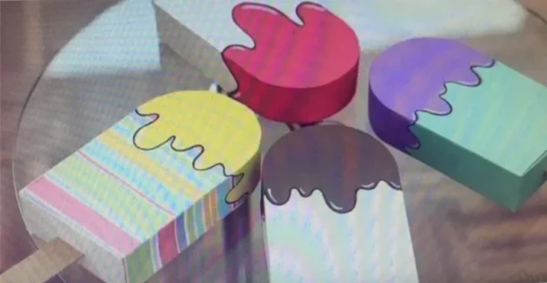 Arquivo de corte para caixa personalizada em formato de picolé para decoração de festa infantil.