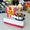 Personalizados para centro de mesa tema cinema em arquivo digital de alta resolução.