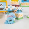 Decoração de festa infantil tema Monstrinhos com centro de mesa em arquivo digital Studio e PDF.