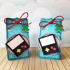 Topper de bolo e elementos de centro de mesa tema video game prontos para imprimir e recortar.