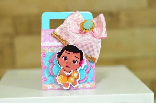 Topper de bolo e elementos de decoração para aniversário no tema Moana Bebê prontos para imprimir e recortar.
