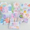 Segundo gabarito digital para personalizados de festa de aniversário dos Ursinhos Carinhosos com balões e estrelas cadentes, exibindo marcações estruturadas para dobras e recorte limpo.