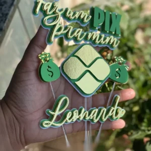 Topper de bolo com o símbolo do Pix verde espelhado e moderno, notas de dinheiro em espécie voando ao redor e uma chave Pix fictícia estilizada em camadas tridimensionais em arquivo digital de corte.