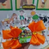 Arquivo digital com moldes do pintinho Amarelinho, pato Tarica e porquinha Doña Pancha em camadas coloridas para mesa de aniversário.