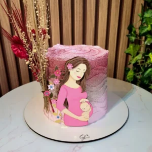 opper de bolo com a silhueta delicada de uma mãe grávida de perfil segurando a barriga, cercada por flores em tons pastéis de rosa e azul, ramos dourados espelhados e borboletas vazadas em camadas tridimensionais em arquivo digital de corte.