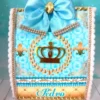 Arquivo de corte digital para festa tema reinado em formato Studio e PDF, exibindo detalhes de uma coroa real dourada com ramos de louros para topo de bolo e caixas personalizadas.