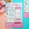 Rótulo digital para bala com fundo rosa pastel estampado com flores e ramos delicados, destacando o laço da campanha estilizado em tons de rosa e dourado em arquivo digital.