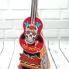 Projeto digital de centro de mesa com estampa de caveira mexicana e base estrutural para sustentação de papelaria, aberto em software de corte.