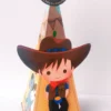 Topper de bolo com cavalinho, ferradura e estrela de xerife em camadas para decoração de festas no tema Cowboy.