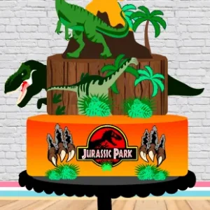 Elementos digitais para topo de bolo com o tema Jurassic Park, exibindo o icônico portal de entrada do parque com tochas de fogo acesas, folhagens tropicais verdes e a silhueta clássica do Tiranossauro Rex em camadas de papel.