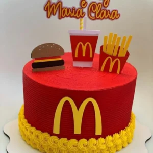 Gabarito digital de topo de bolo temático com a icônica caixa do McLanche Feliz, batatas fritas douradas, hambúrguer e a famosa letra M amarela sobre fundo vermelho, exibindo as linhas estruturadas de contorno e camadas para recorte na Silhouette.
