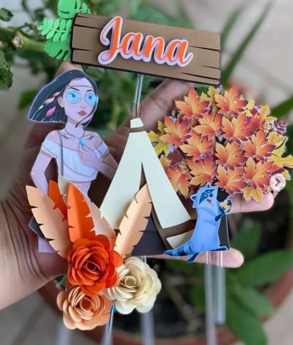 Gabarito digital de topo de bolo da personagem Pocahontas com folhas ao vento em tons de terracota, turquesa e dourado, exibindo as linhas estruturadas de contorno e camadas para recorte na Silhouette.