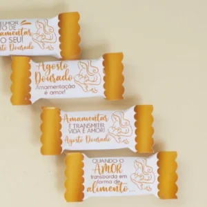 Gabarito digital de rótulos e embalagens para balas personalizadas com ilustrações de amamentação, corações e o laço dourado símbolo da campanha, exibindo as linhas estruturadas de contorno para recorte.