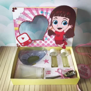 Maquete digital de embalagem personalizada tema confeitaria com o nome Giovanna, exibindo marcações de dobra e corte com estampas de granulados coloridos.