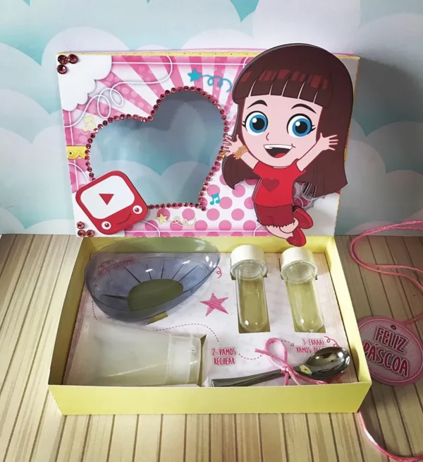 Maquete digital de embalagem personalizada tema confeitaria com o nome Giovanna, exibindo marcações de dobra e corte com estampas de granulados coloridos.