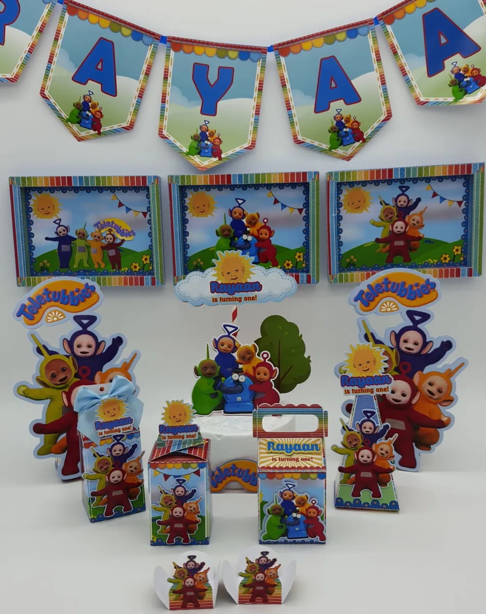 Arquivo de corte digital do tema Teletubbies nos formatos Studio e PDF, exibindo moldes de topo de bolo com o Tinky Winky, Dipsy, Laa-Laa e Po em camadas coloridas prontos para o recorte.