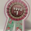 Maquete digital de caixas personalizadas e elementos decorativos de festa com o tema Vovó n°1 com linhas de vinco e detalhes florais prontos para recortar na plotter.