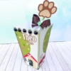 Caixas personalizadas em camadas com elementos de patinhas de cachorro e ossinhos. Arquivo digital de corte em formatos Studio e arquivo em PDF.