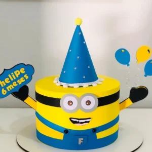 Topper de bolo personalizado do tema Minions. Arquivo de corte digital exclusivo para Silhouette Studio, ideal para decoração de festa infantil.
