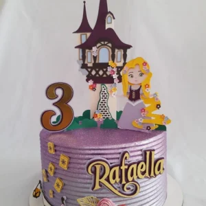 Arquivo de corte digital de topo de bolo no tema Rapunzel Enrolados em formato Studio para Silhouette, mostrando a silhueta da torre, a trança dourada com flores, o camaleão Pascal e o sol do reino dispostos em camadas prontas para recorte tridimensional.