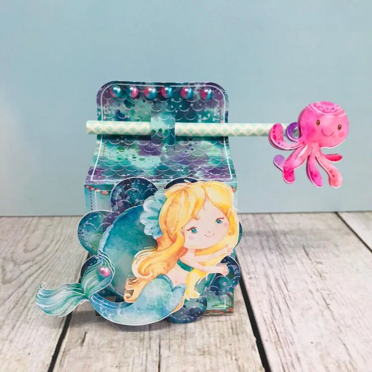 Kit de artes e moldes de caixas para doces de aniversário com corte especial de concha de sereia. Arquivo digital nos formatos Studio e PDF.